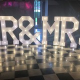 4 foot tall LED lights displayed in hall with photo booth on hire in Windsor Berkshire