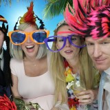 Guests in props photographed using a green screen photo booth on hire from Animation Events LTD at a wedding in Basingstoke