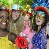 image of four friends enjoying a photo booth hired from animation events at a wedding in Basingstoke