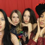 Ladies in a photo booth hire at a wedding in wotton house