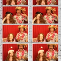 We were please to capture memories for Luke and Magda at Farnham Castle in our Photo booth Couple having photos taken inside a photo booth at a wedding reception at Farnham Castle
